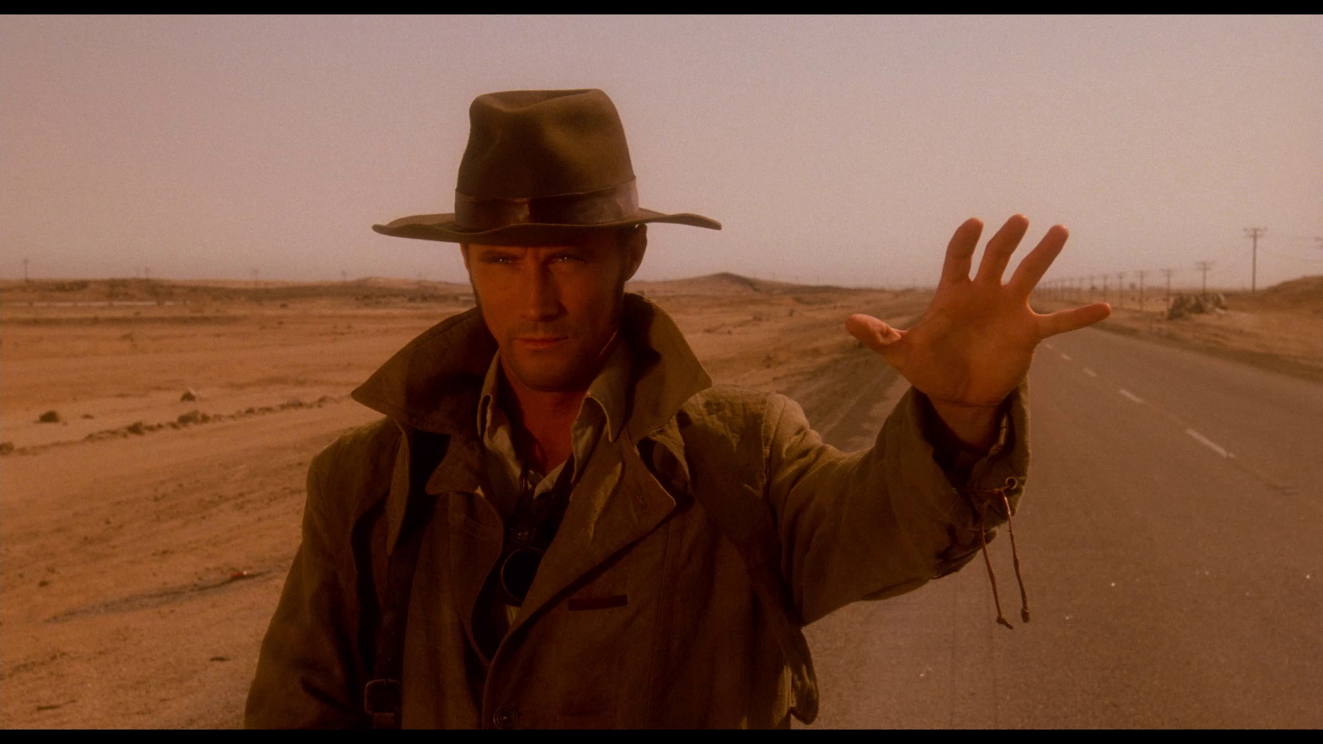 Still from Dust Devil (1992) 4K & Blu-ray T-Shirt Collector's Edition (+ Color Out Of Space)